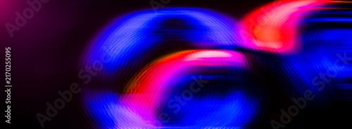 Dynamic Neon Blue and Magenta Light Trails Abstract Background
