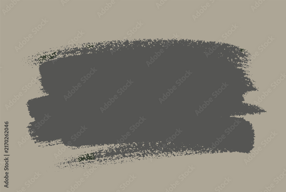 Fototapeta premium Thick horizontal charcoal gray paint brush stroke with rough edges centered on a neutral taupe colored paper background.