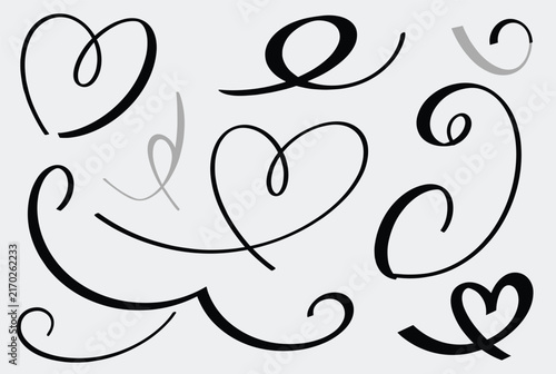 Elegant set of black calligraphic flourishes, swirls, and heart shapes on a light gray background for sophisticated designs.