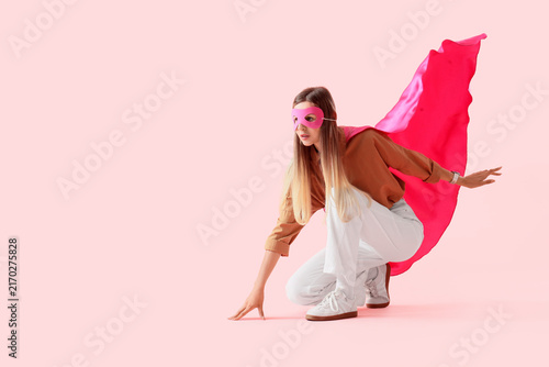Cuadro en lienzo Empowerment and confidence, young woman in superhero mask and cape ready for act