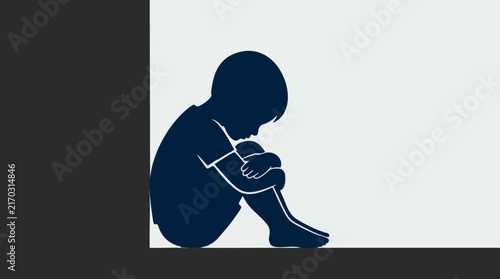 Silhouette of a sad, lonely child sitting in a corner, social issue