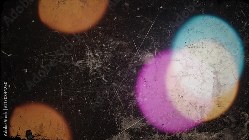 Abstract colorful bokeh lights on scratched textured background for creative design