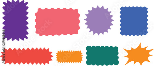 Collection of colorful decorative ribbons and labels with jagged edges in various shapes and sizes on a white background