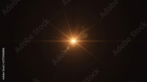 Golden Starburst Light Effect with Bokeh on Black lens flare