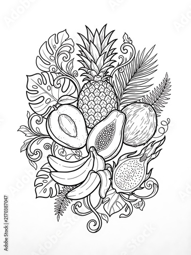 Assortment of tropical fruits and exotic leaves arranged in decorative cluster for healthy eating.
