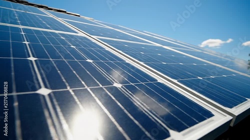Close up of solar panels absorbing sunlight for renewable energy generation on a clear sunny day