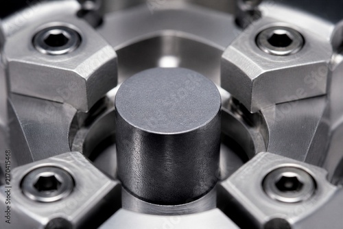 Naklejka Cylindrical metal component held in precision fixture