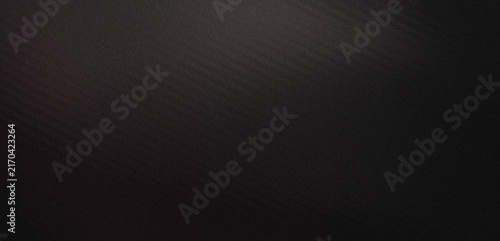 Abstract dark black textured background with subtle diagonal light streaks and a grainy surface finish with light gradients across texture soft diagonal surface fine