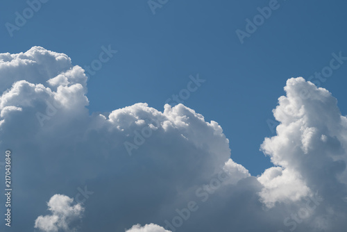 Photography Large white cumulus clouds against a clear blue sky