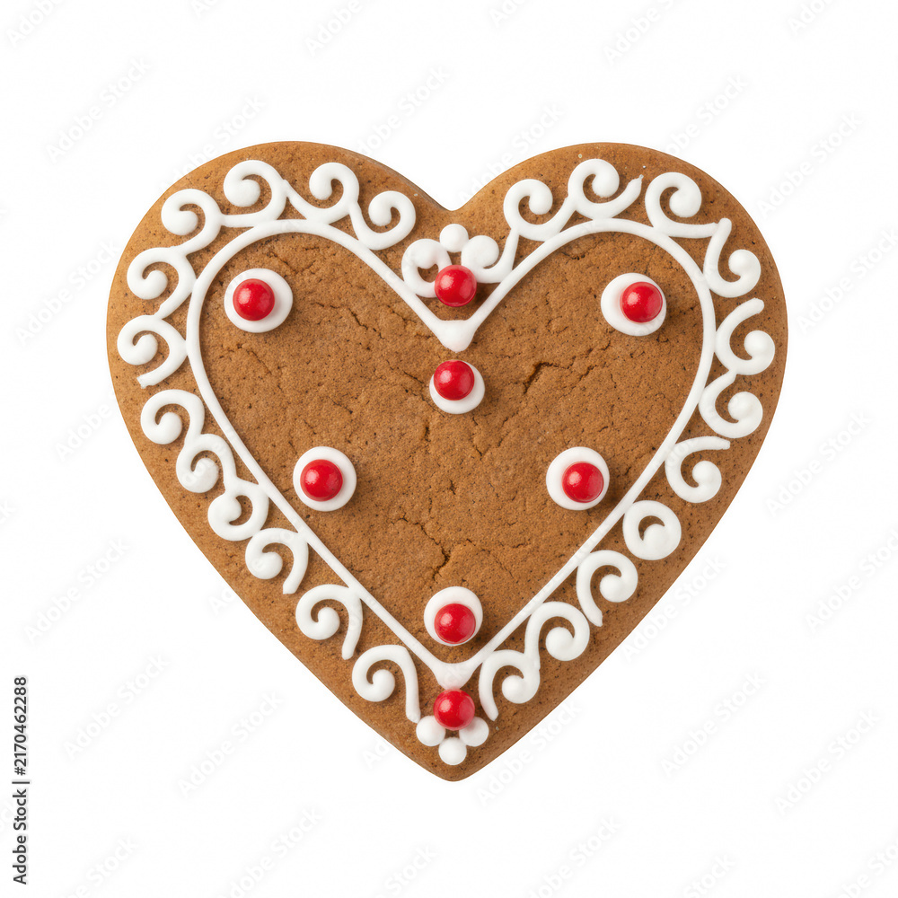Obraz premium A single heart shaped gingerbread cookie with white icing decoration and red sugar pearls for a holiday treat