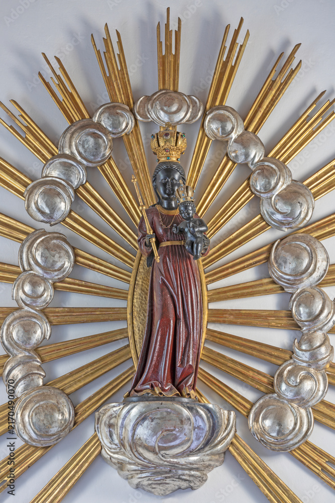 Fototapeta premium Salzburg - The carved polychrome statue of Black Madonna in the church Loretokirche by unknown artist.
