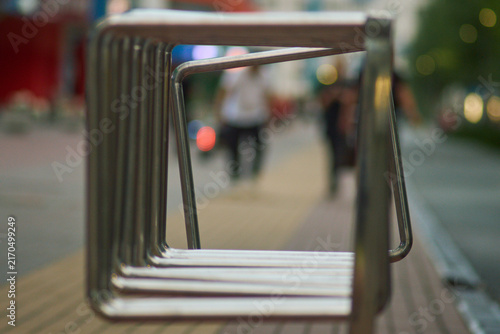 Modern Stainless Steel Bicycle Rack Framing City Alley Perspective