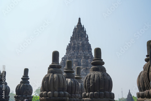 Fotografie Detailed stone carvings and stupas of Prambanan ancient Hindu temple compound in Yogyakarta, Indonesia