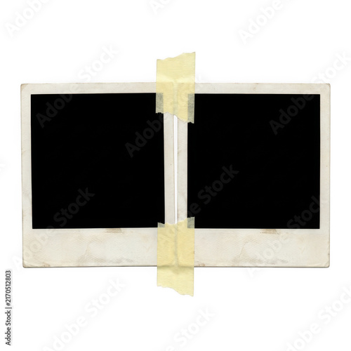 Two old empty polaroid photo frames taped together