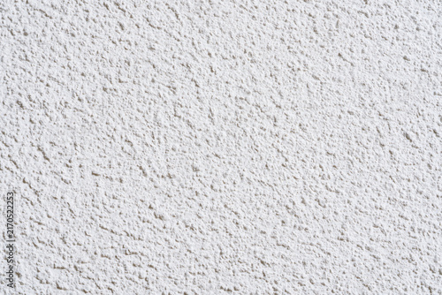 Fotografía White textured stucco plaster surface background for abstract design