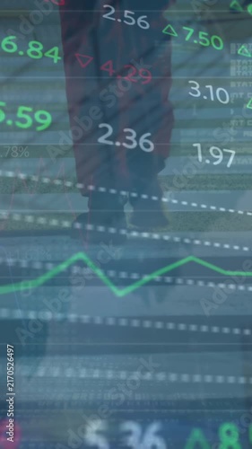 Animation of trading board and graphs over low section of man walking on street