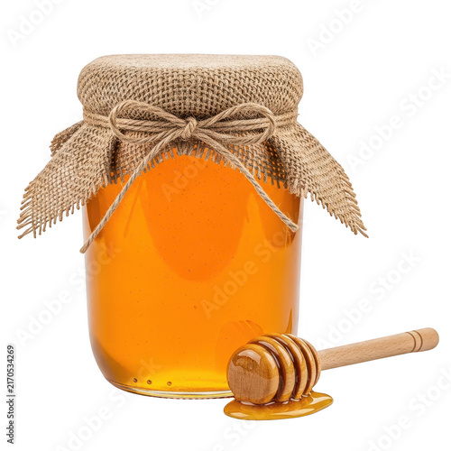 Glass jar filled with golden honey and a wooden dipper on a rustic kitchen table isolated on transparent background