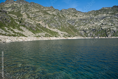 Estany Primer de Juclar lake near Refugi de Juclar hut in Pyrenees mountains in Andorra