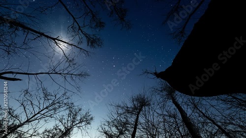 Glowing Christmas star above a peaceful mountain landscape with night sky