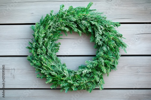 Traditional christmas wreath with red baubles and copy space isolated on white background