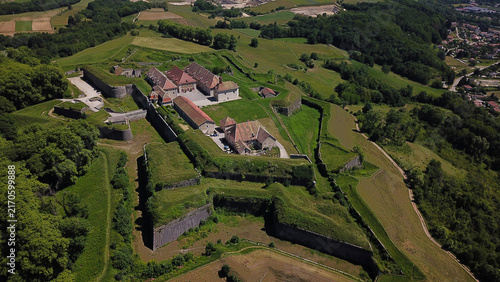 Aerial view of Fort Barraux, a historic star-shaped fortress with stone ramparts and grassy bastions in Barraux, Auvergne-Rhone-Alpes, France.
