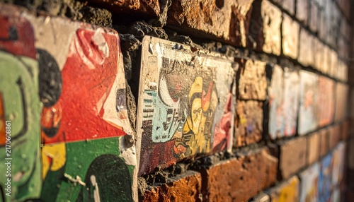 Vintage Sticker Art on Grungy Brick Wall - Urban Retro Vibe