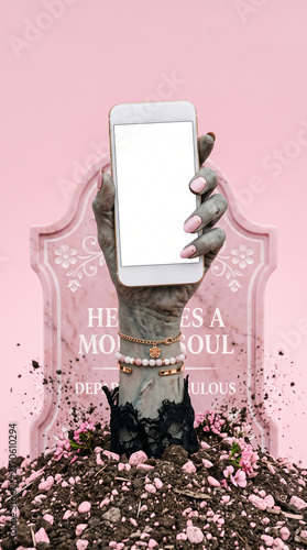 A zombie hand holds a blank smartphone, emerging from a grave with flowers, symbolizing resurrection and digital afterlife concepts