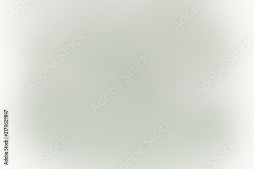 Soft blurred grey background, with a subtle, vignette effect, creating, a clean and, neutral surface for, displaying or text, in a minimalist way