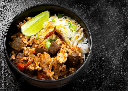 Rice Vermicelli with Northern Thai Curry Sauce (Khanom Chin Nam Ngiao) is a local dish from Northern Thailand.