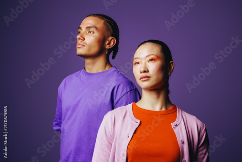 Friends portrait of young adults in studio with confident lifestyle style