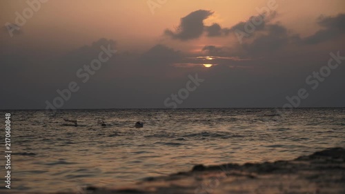 Dramatic sunset cloud timelapse over ocean horizon