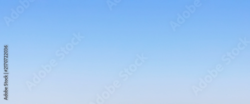 Canvastavla Seamless clear blue sky gradient background featuring a smooth vertical fade from vivid azure to soft pale grey-white, ideal for clean design overlays and digital backdrops