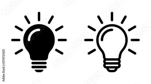 Фотография Light bulb icon set with glowing rays in solid and outline vector style