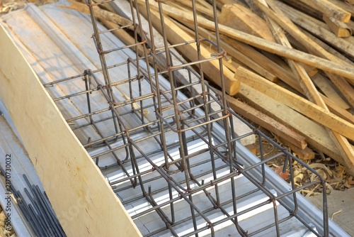 steel rebar cage frame for concrete column foundation at a construction site