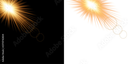 Golden starburst light effect with lens flare isolated on black and white backgrounds