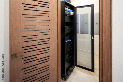 Modern home server room with an open network server rack cabinet 