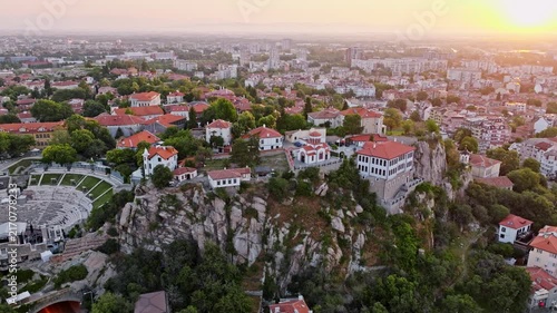Aerial view Plovdiv old town ancient Roman theatre hill sunrise golden hour summer cityscape travel destination Bulgaria Europe historic landmark panorama