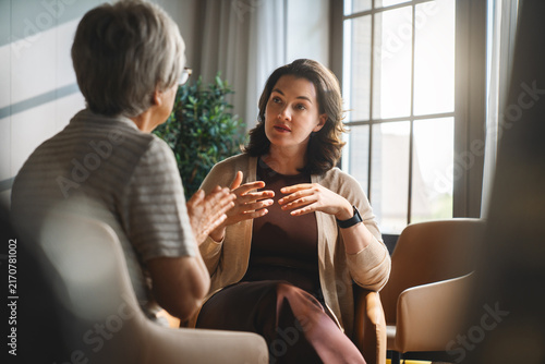 Bild auf Leinwand Therapist and Client Engaged in Emotional Counseling Session