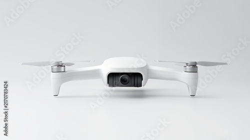 A white quadcopter drone with a camera is shown against a white background