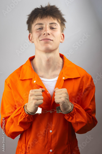 Canvastavla Teenage Prisoner in Orange Jumpsuit