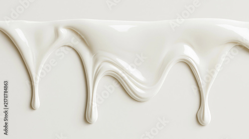 White ice cream drips on a light surface. Close-up texture for food, dairy, cosmetics, or design visuals.
