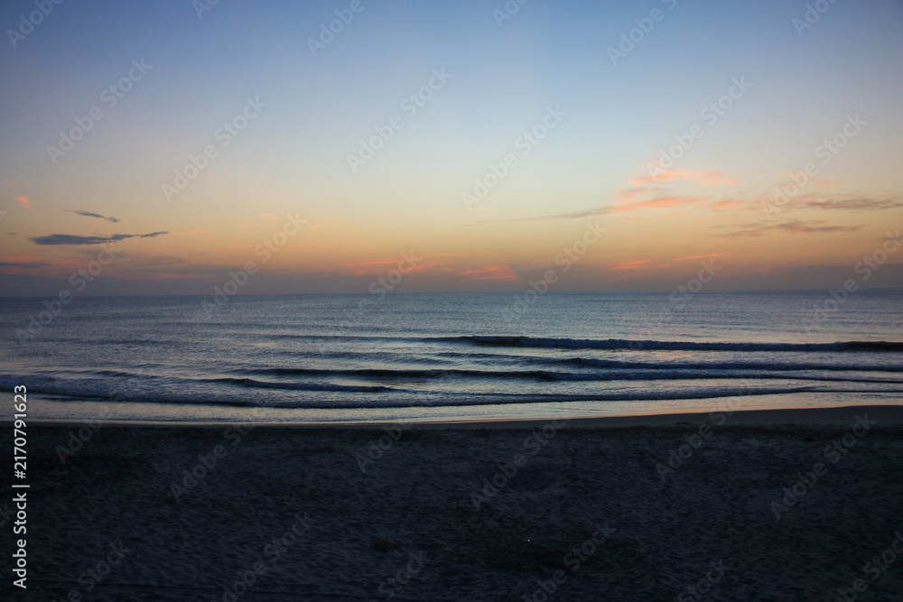 Fototapeta premium Sunrise View Over the Ocean at Corolla North Carolina in the Outer Banks