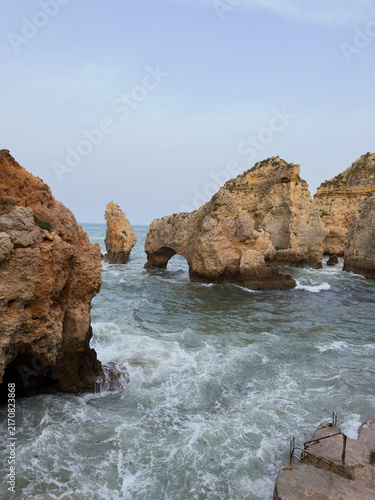 Dramatic rock formations and sea stacks along Algarve coastline