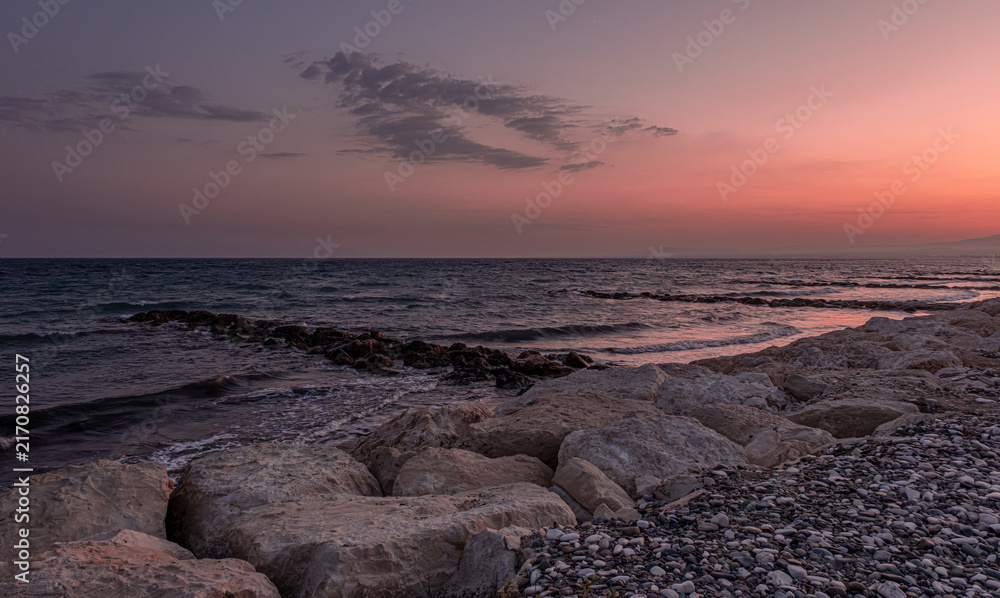 Obraz premium View of Pervolia village sea coast, beach and sea, after sunset, Larnaca district, Cyprus