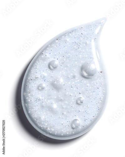 Minimalist serum drop macro with glossy texture and micro bubbles, skincare product detail, ultra clean lighting isolated on white background