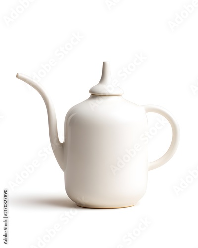 Minimalist white ceramic oil dispenser with narrow spout and matte glaze, kitchen accessory isolated on white background