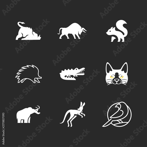 Minimalist White Animal Logos and Icons Set, Featuring Diverse Wildlife Silhouettes on a Dark Background