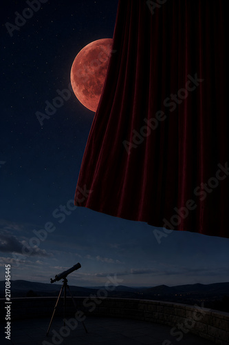 Observing a lunar eclipse with a telescope under the night sky