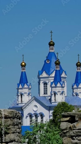 Alexander Nevsky Cathedral with Blue Domes in Kamianets Podilskyi Ukraine on Sunny Day