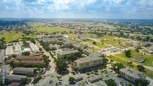 Konstfotografi Large residential buildings border open fields near Broadway
